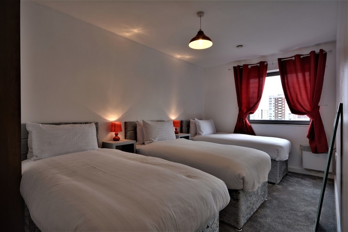 Imagen de la habitación del Hotel The Reach. Foto 4