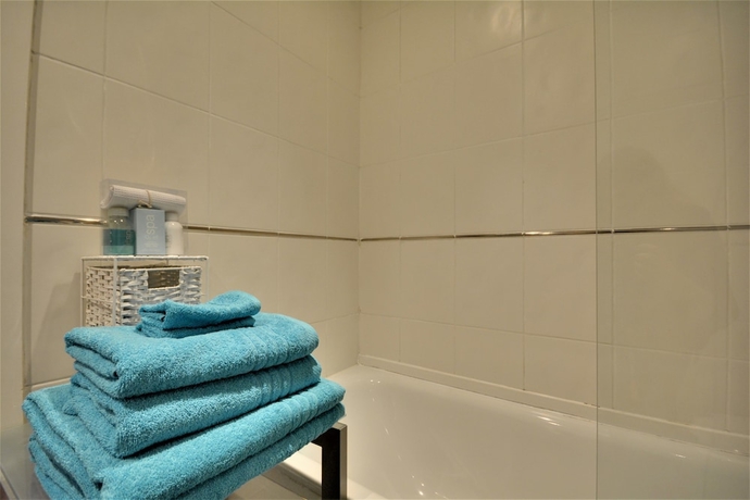 Imagen de la habitación del Hotel The Reach. Foto 14