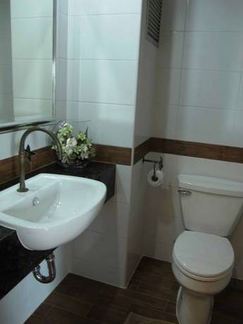 Imagen de la habitación del Hotel The Red Balcony Inn. Foto 6