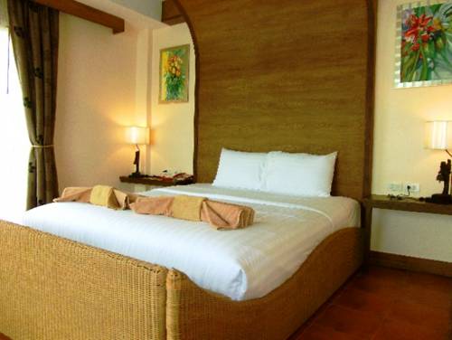 Imagen de la habitación del Hotel The Red Balcony Inn. Foto 7