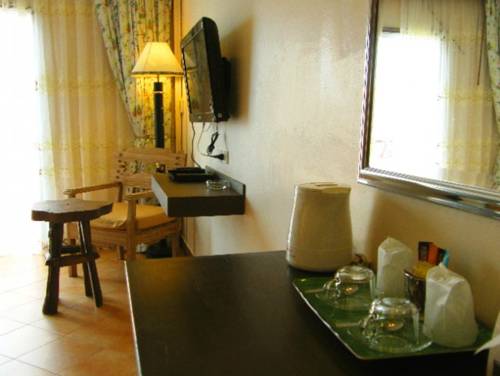 Imagen de la habitación del Hotel The Red Balcony Inn. Foto 8