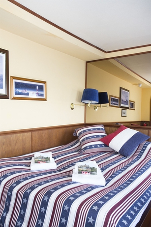 Imagen de la habitación del Hotel The Red Boat. Foto 5