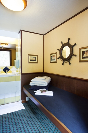 Imagen de la habitación del Hotel The Red Boat. Foto 6