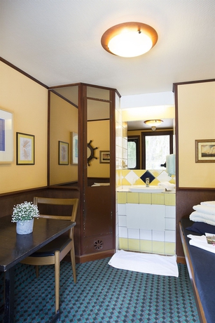 Imagen de la habitación del Hotel The Red Boat. Foto 7