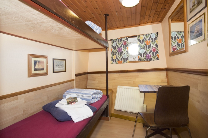 Imagen de la habitación del Hotel The Red Boat. Foto 8