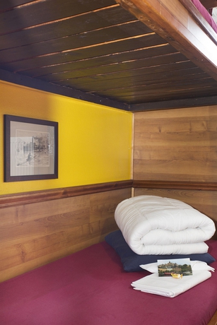 Imagen de la habitación del Hotel The Red Boat. Foto 9