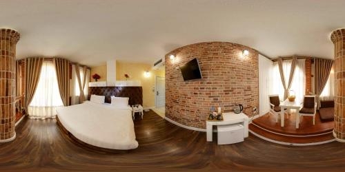Imagen de la habitación del Hotel The Red Bricks, Shkoder. Foto 6