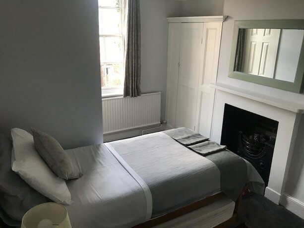 Imagen de la habitación del Hotel The Red House Guest House. Foto 13
