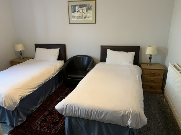 Imagen de la habitación del Hotel The Red House Guest House. Foto 20