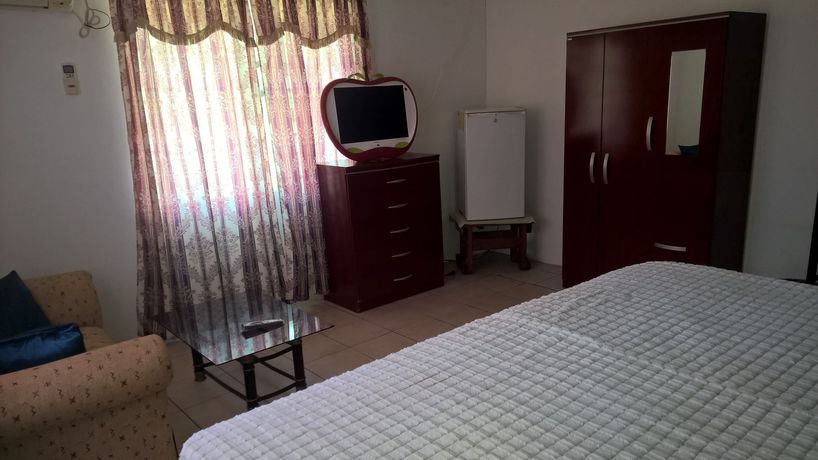 Imagen de la habitación del Hotel The Red Hut Inn. Foto 2