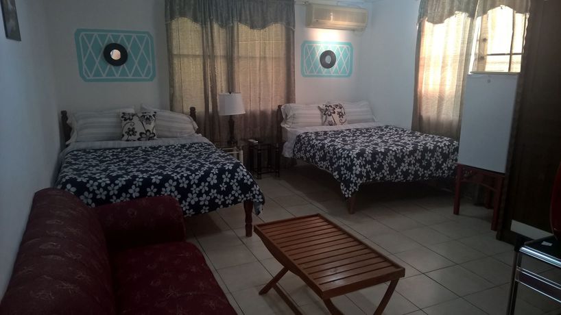 Imagen de la habitación del Hotel The Red Hut Inn. Foto 6