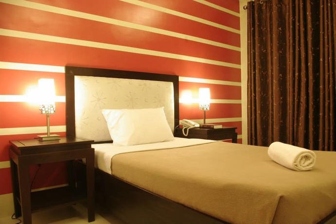 Imagen general del Hotel The Red Palm Suites And Restaurant. Foto 4
