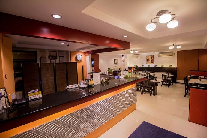 Imagen general del Hotel The Red Palm Suites And Restaurant. Foto 12