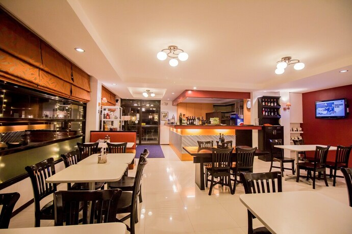 Imagen general del Hotel The Red Palm Suites And Restaurant. Foto 1
