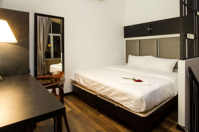 Imagen de la habitación del Hotel The Reeds Boutique. Foto 10
