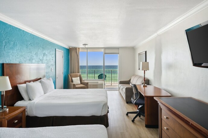 Imagen de la habitación del Hotel The Reef At Seahaven Beach Resorts. Foto 11