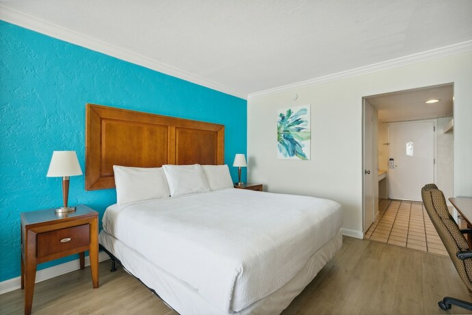 Imagen de la habitación del Hotel The Reef At Seahaven Beach Resorts. Foto 13