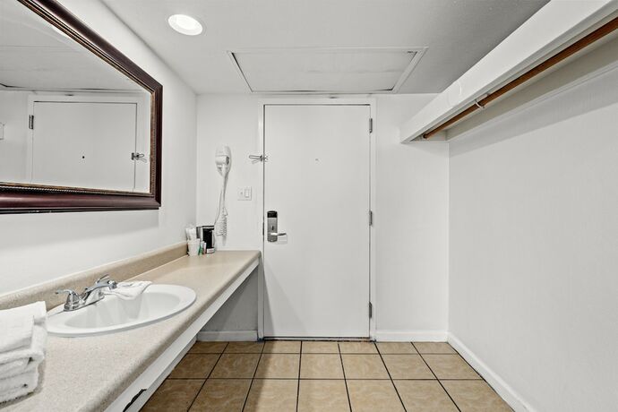 Imagen de la habitación del Hotel The Reef At Seahaven Beach Resorts. Foto 15