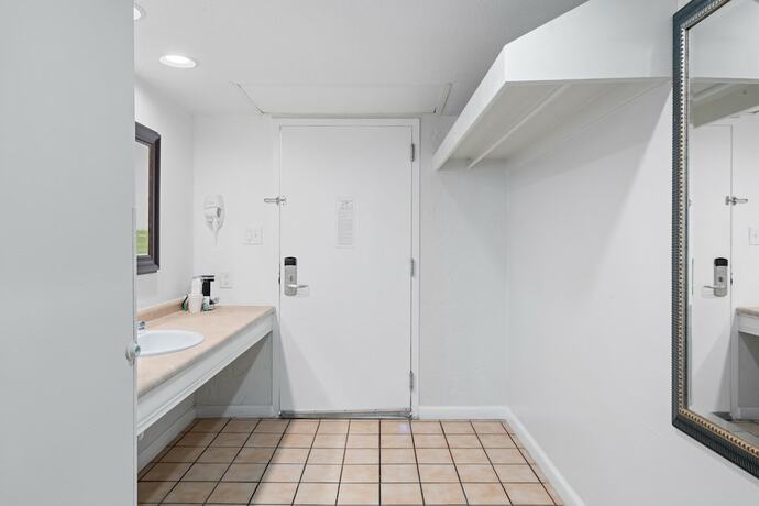 Imagen de la habitación del Hotel The Reef At Seahaven Beach Resorts. Foto 18