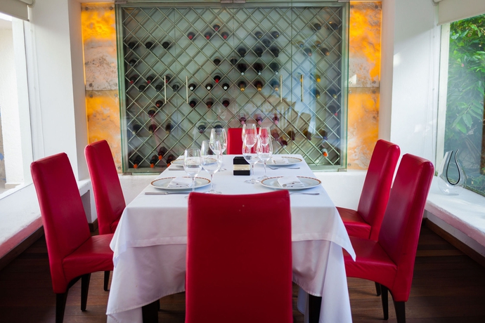 Imagen del bar/restaurante del Hotel The Reef Playacar Resort and Spa - Optional All Inclusive. Foto 3