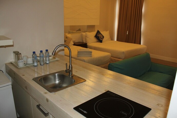 Imagen de la habitación del Hotel The Reef and Residences. Foto 16