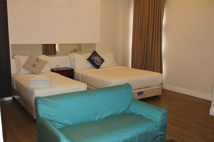 Imagen de la habitación del Hotel The Reef and Residences. Foto 17