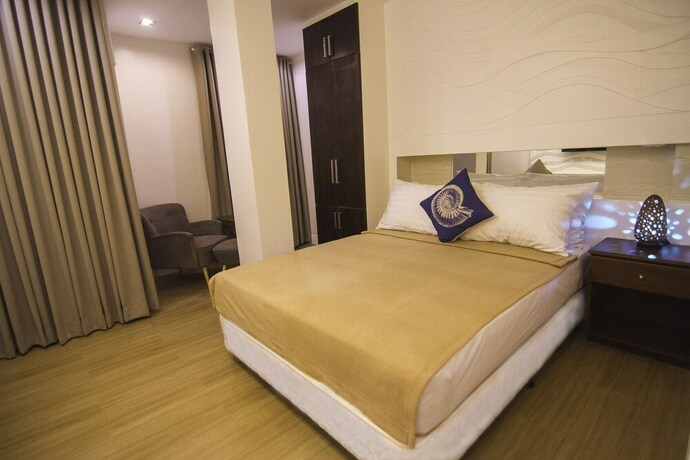 Imagen de la habitación del Hotel The Reef and Residences. Foto 18