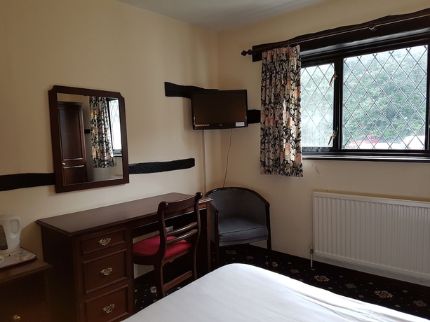 Imagen de la habitación del Hotel The Regency Hotel. Foto 9