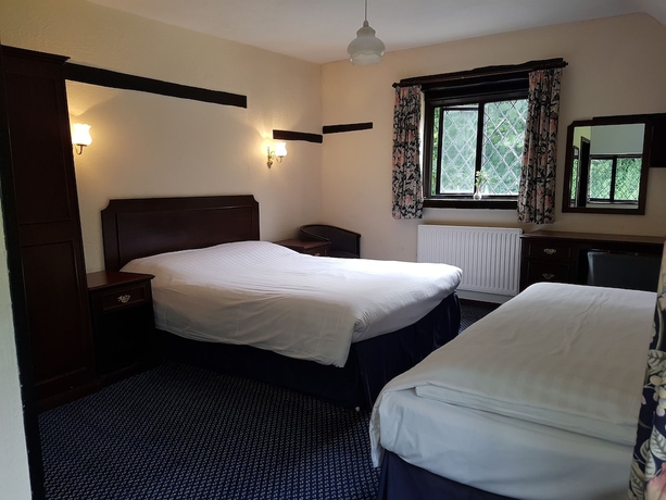 Imagen de la habitación del Hotel The Regency Hotel. Foto 10