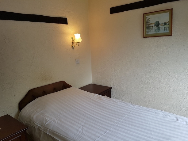 Imagen de la habitación del Hotel The Regency Hotel. Foto 14