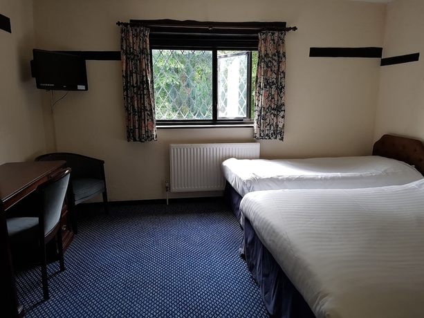 Imagen de la habitación del Hotel The Regency Hotel. Foto 17