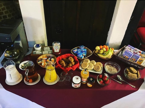 Imagen del bar/restaurante del Hotel The Regency Hotel. Foto 5