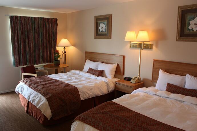 Imagen de la habitación del Hotel The Regency Inn. Foto 18