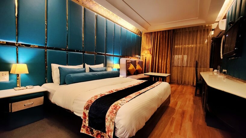 Imagen de la habitación del Hotel The Regent Chandigarh. Foto 11