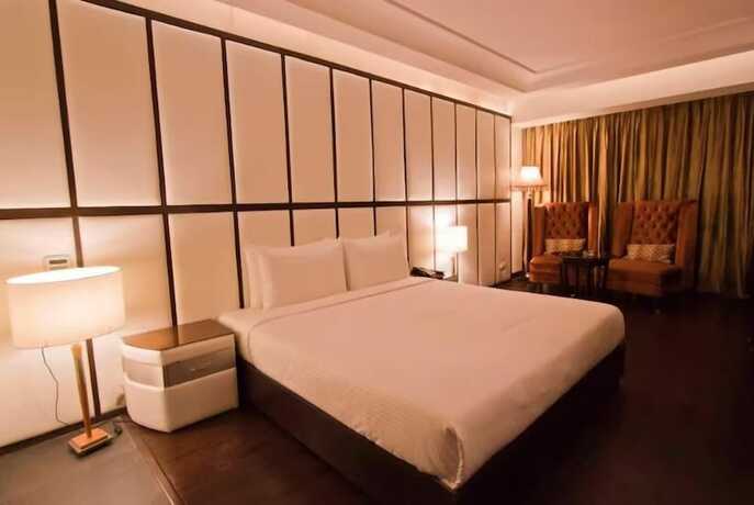 Imagen de la habitación del Hotel The Regent Chandigarh. Foto 14
