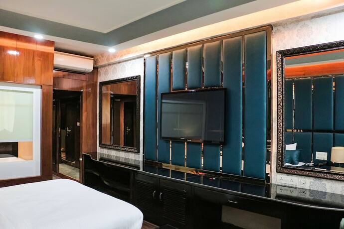 Imagen de la habitación del Hotel The Regent Chandigarh. Foto 17