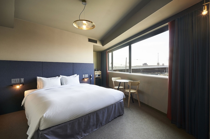 Imagen de la habitación del Hotel The Reign Kyoto. Foto 5