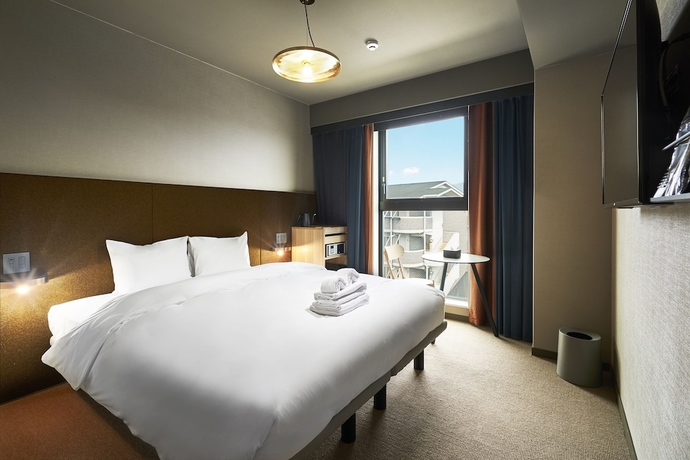 Imagen de la habitación del Hotel The Reign Kyoto. Foto 13