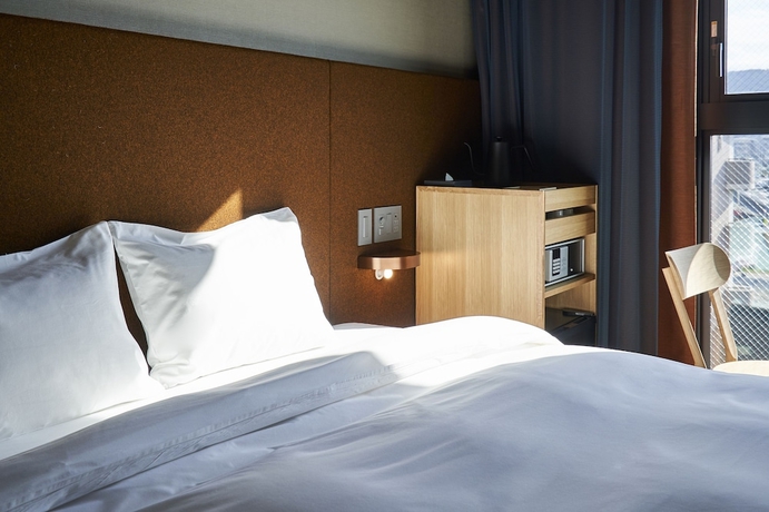 Imagen de la habitación del Hotel The Reign Kyoto. Foto 17