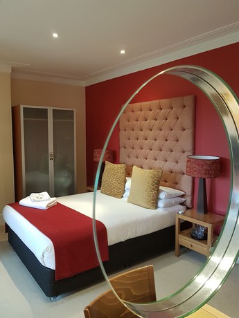 Imagen de la habitación del Hotel The Relish. Foto 7