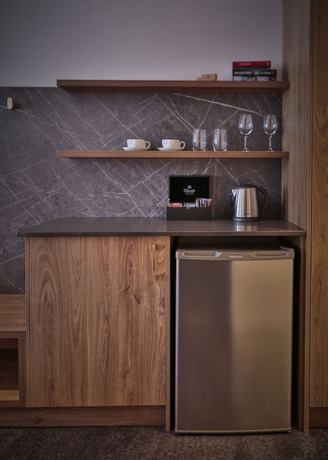 Imagen de la habitación del Hotel The Remington Orange. Foto 12