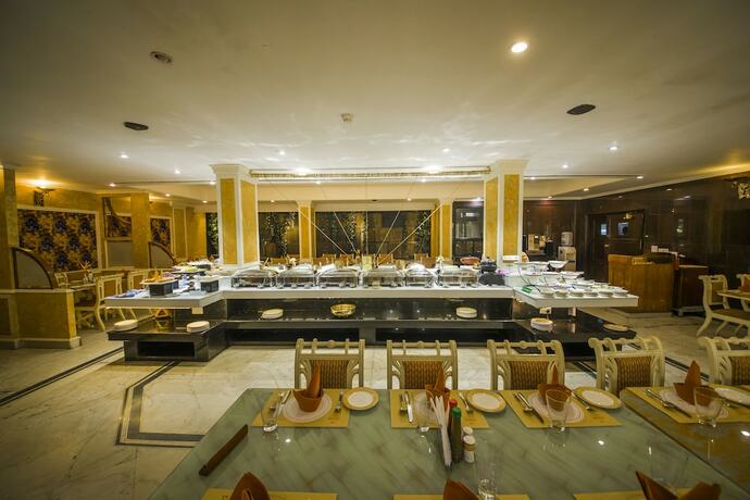 Imagen del bar/restaurante del Hotel The Renai Cochin. Foto 14