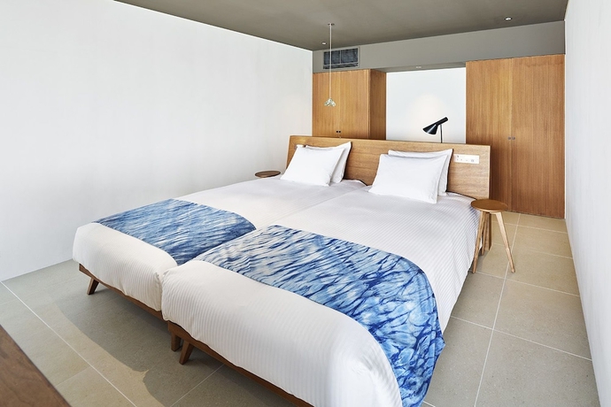 Imagen de la habitación del Hotel The Rescape. Foto 13