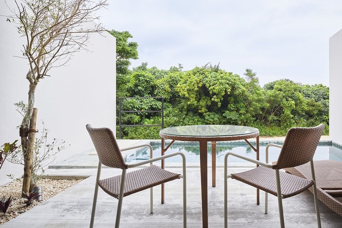 Imagen de la habitación del Hotel The Rescape. Foto 14