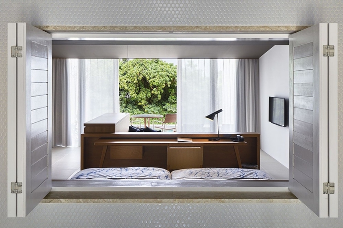 Imagen de la habitación del Hotel The Rescape. Foto 18