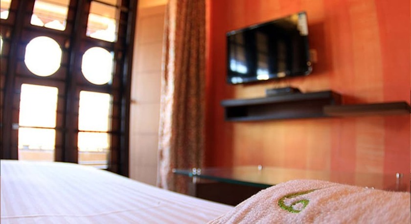 Imagen de la habitación del Hotel The Reserve Gorumara. Foto 18