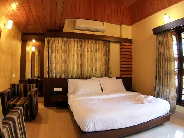 Imagen de la habitación del Hotel The Reserve Gorumara. Foto 19