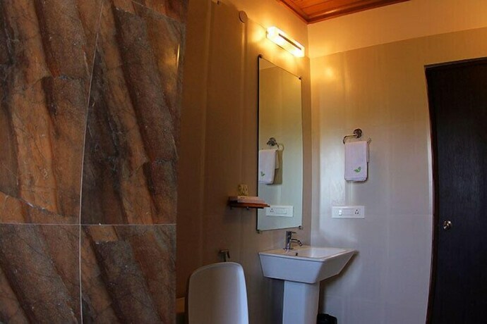 Imagen de la habitación del Hotel The Reserve Gorumara. Foto 23