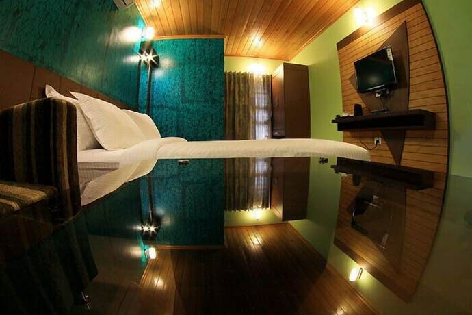 Imagen de la habitación del Hotel The Reserve Gorumara. Foto 27