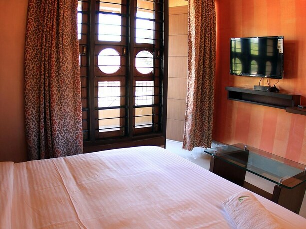 Imagen de la habitación del Hotel The Reserve Gorumara. Foto 32